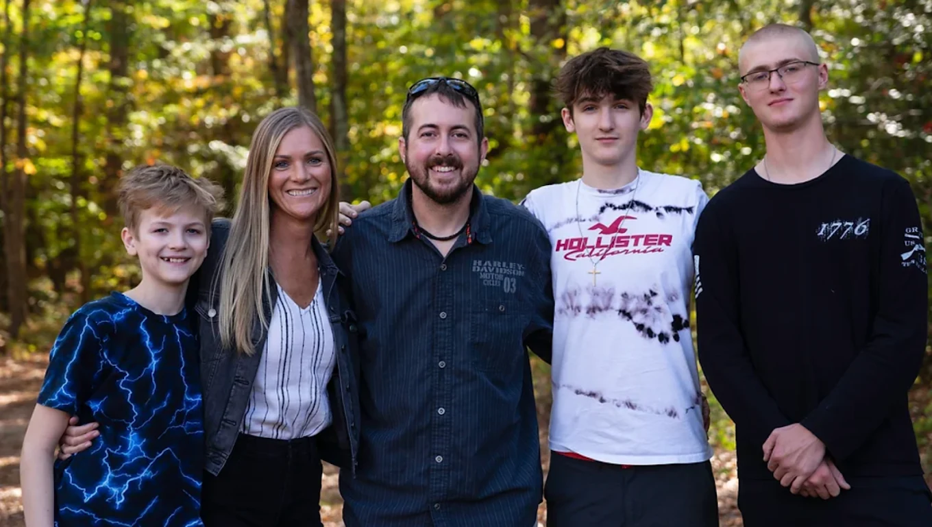 Travis, Alicia, and their family